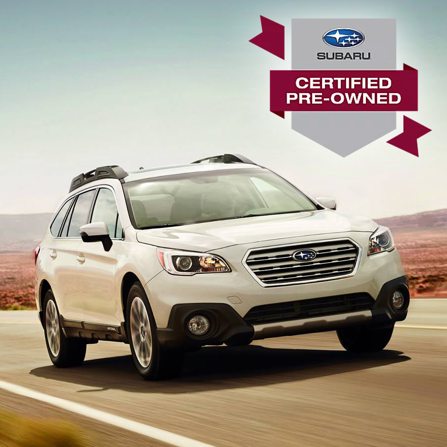 Subaru Certified Pre-Owned Outback driving on an open road