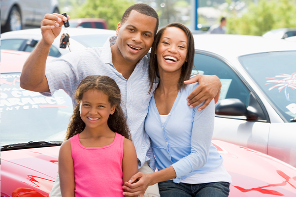 Family picking up used car